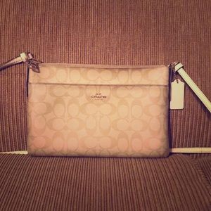 Tan Coach crossbody purse